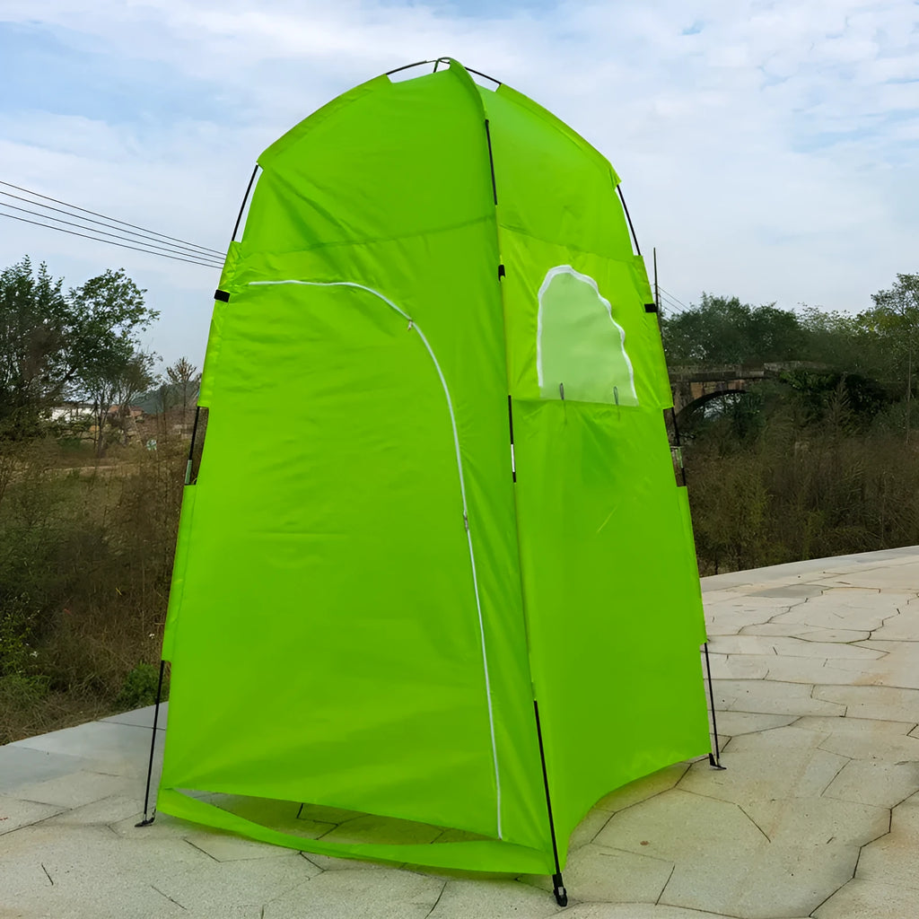 Outdoor dressing tent 120x120x210cm in blue with glass fibre pole structure set up on a beach