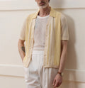 Yellow casual polo shirt with asymmetric hollow-out design and short sleeves