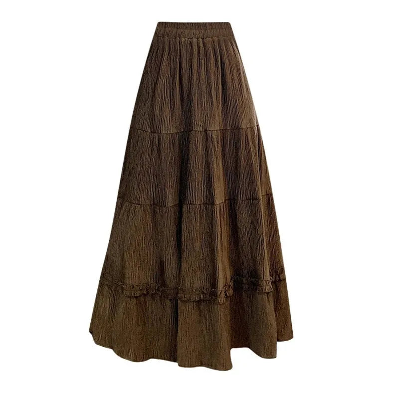 Women's corduroy A-line midi skirt with elastic waistband in milky white, black, and brown colours