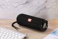 Blue portable Bluetooth speaker with a fabric card holder on the front