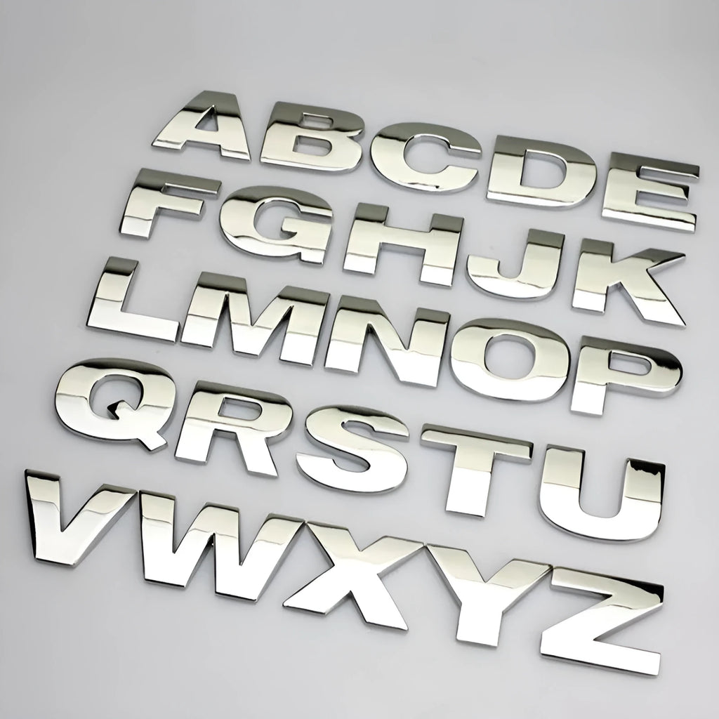 Zinc alloy metal car bumper sticker showing raised 3D letter design in approximately 2.5cm size