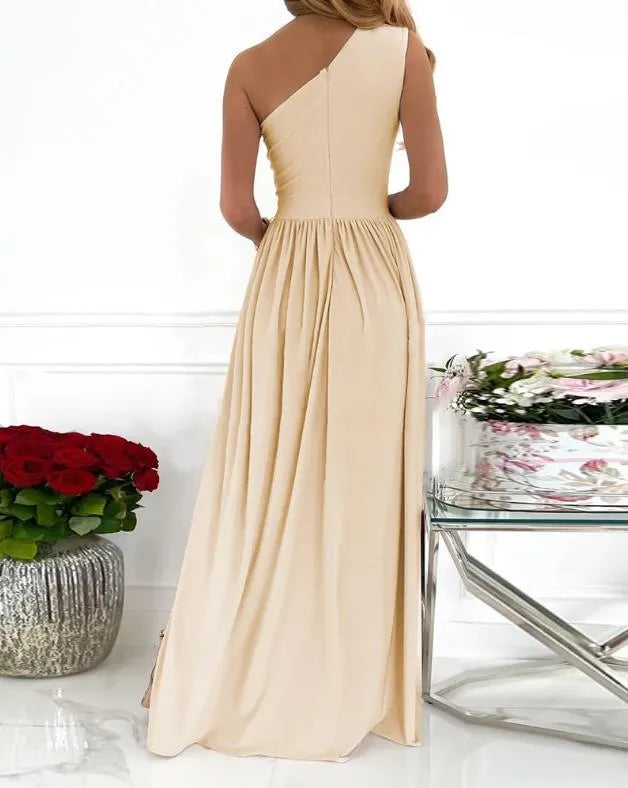 Women's apricot one shoulder sleeveless maxi dress with high leg split and cutout detail.