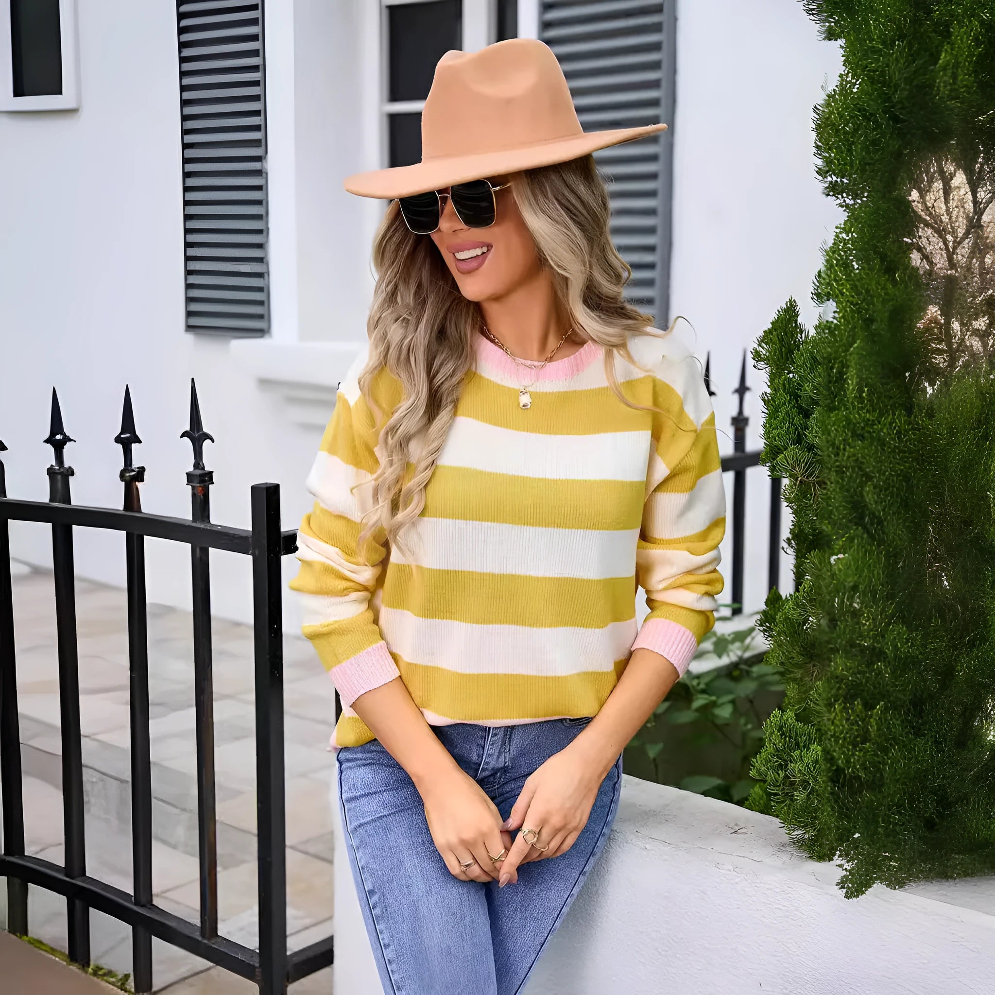 Women's loose fit long sleeve acrylic sweater in blue colour with striped pattern