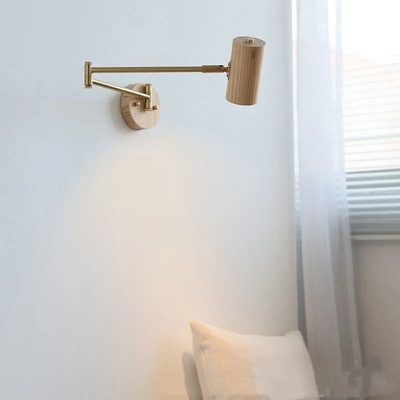 Retro rotating wall lamp with long adjustable arm and integrated switch in walnut wood finish