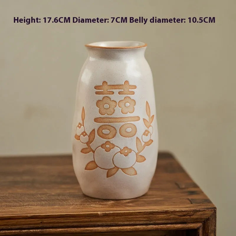 Chinese hand-painted ceramic joy vase with traditional designs and 8 cm base