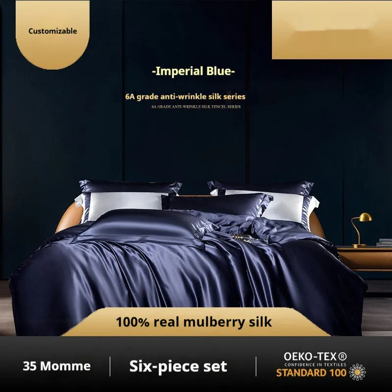 Solid colour silk quilt cover four-piece bedding set shown on bed