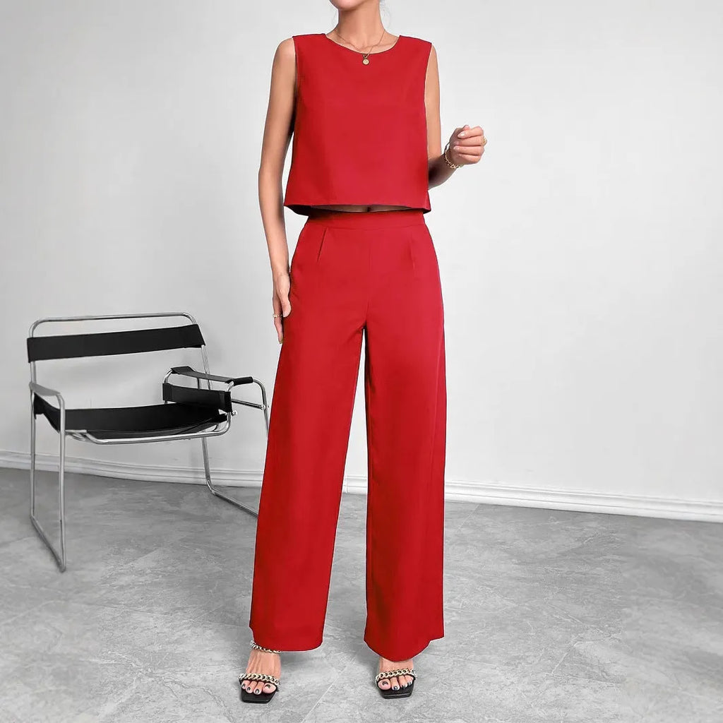 Red and navy blue women's sleeveless top and wide leg pants two-piece set on a hanger.