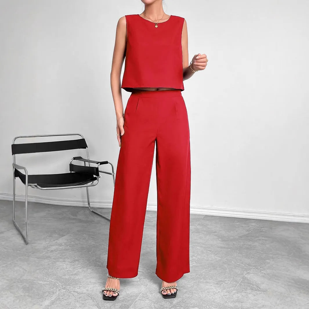 Red and navy blue women's sleeveless top and wide leg pants two-piece set on a hanger.