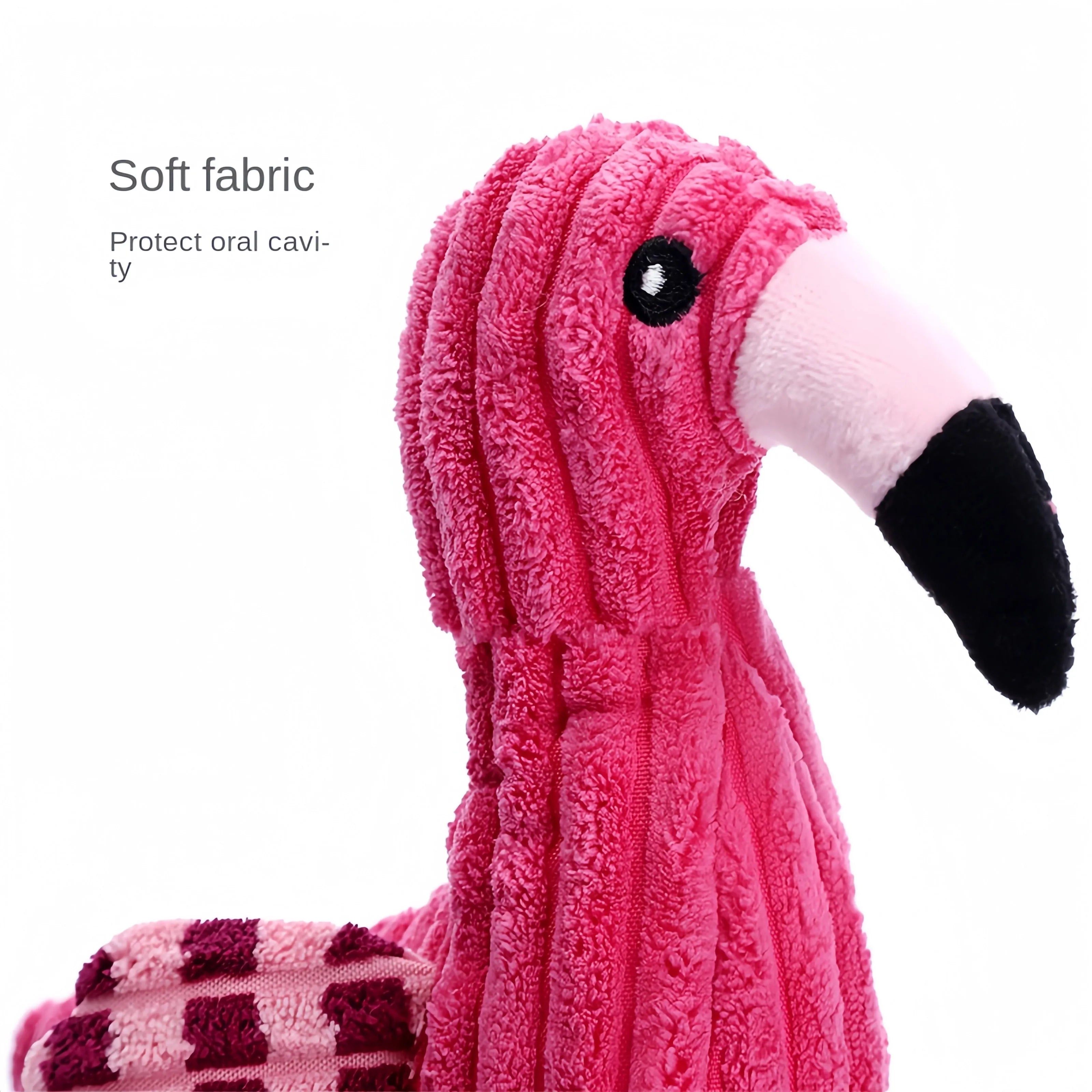 Pink animal-shaped corduroy plush dog toy with a squeaker.