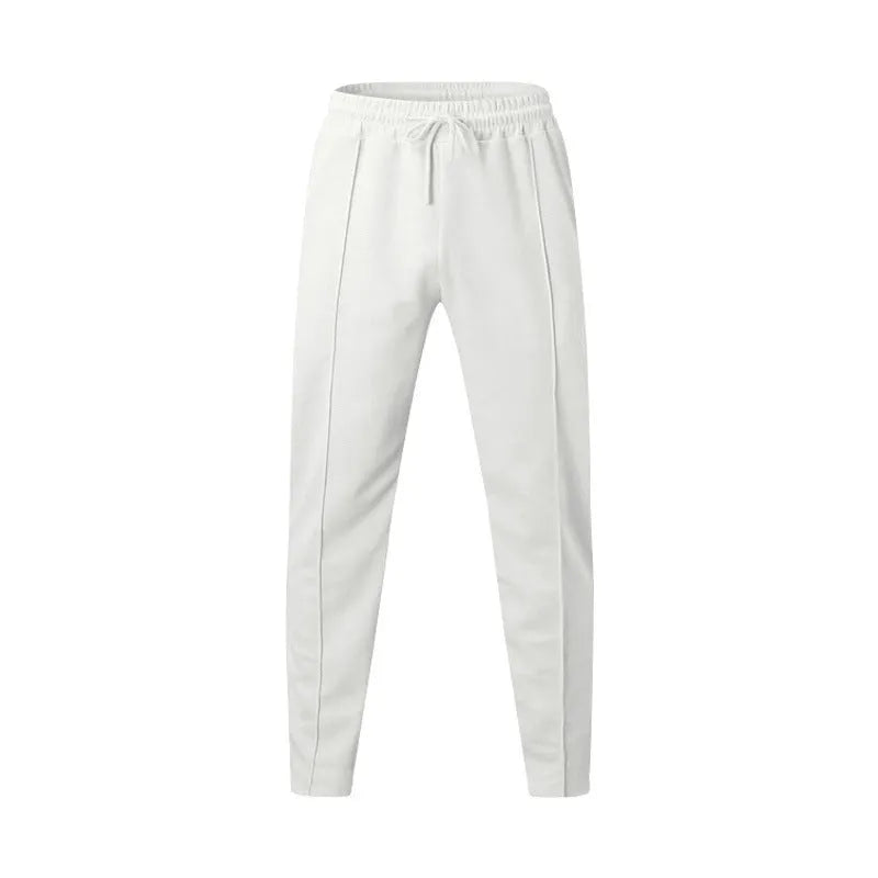 Men's loose straight drawstring trousers in waffle polyester fabric, shown in multiple colour options