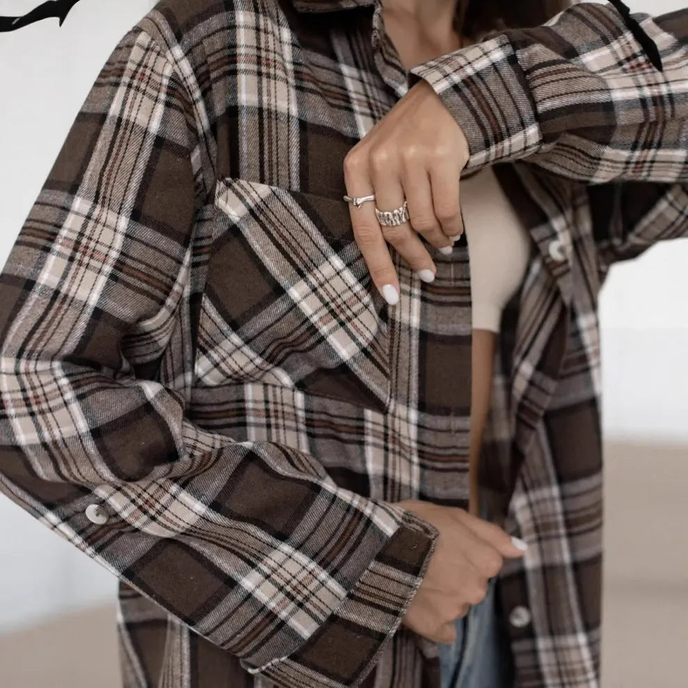 Women's dark brown retro striped long sleeve cotton shirt on a hanger.