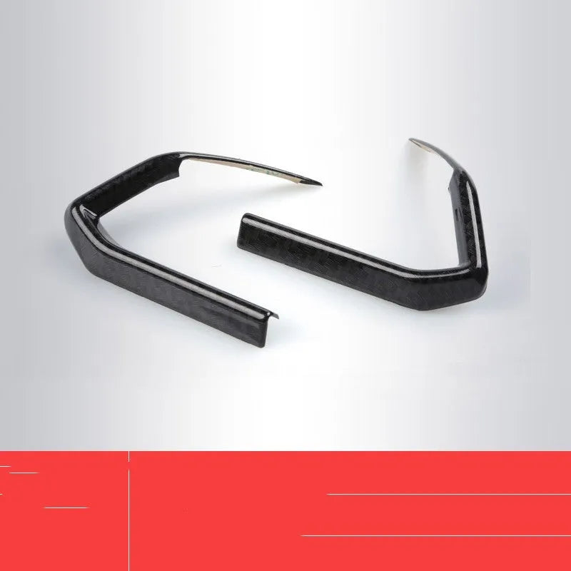 Pair of black ABS plastic steering wheel frame decoration panels for car interior trim.