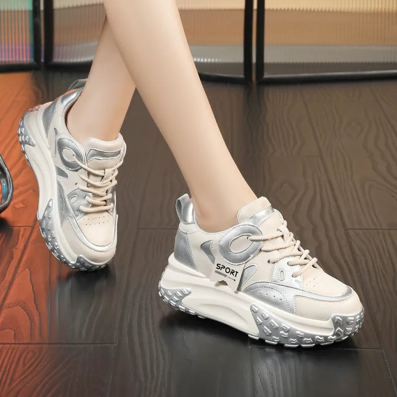 Women's leather casual shoes with a thick wedge heel and lace-up front in four colour options.
