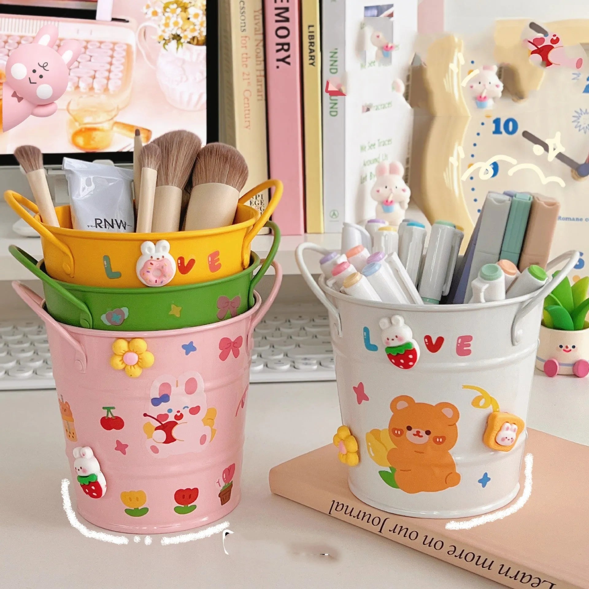 Round metal pen holder in green colour with decorative sticker patch design on desktop