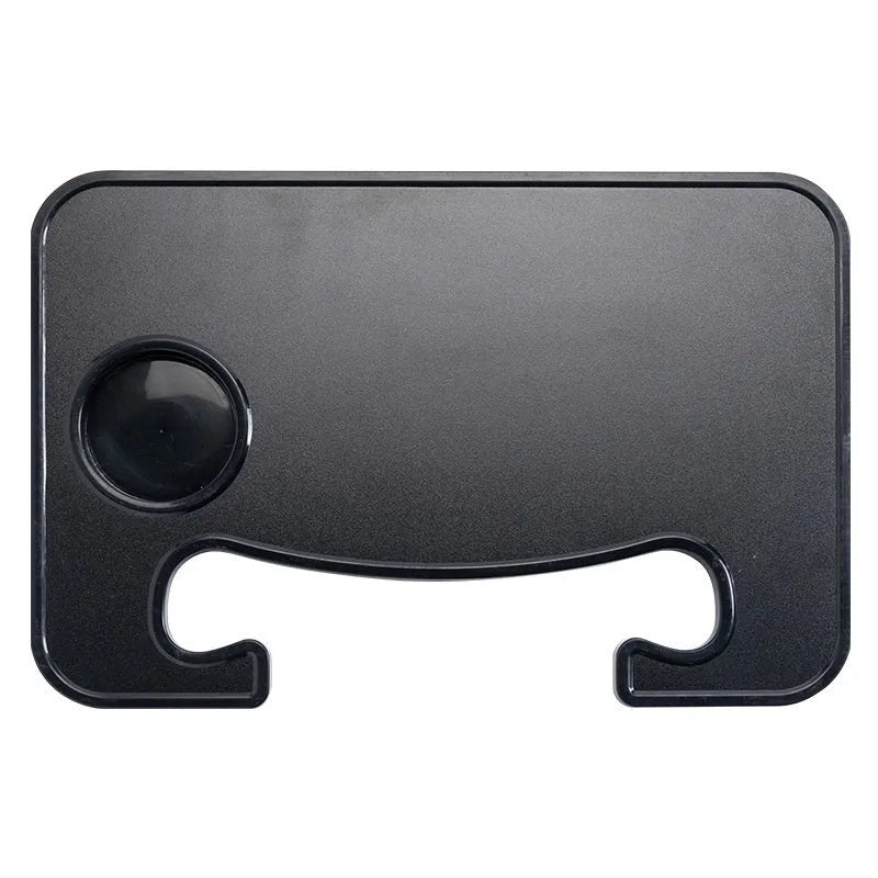 Black ABS plastic car steering wheel laptop stand with foldable cup holder on a grey steering wheel