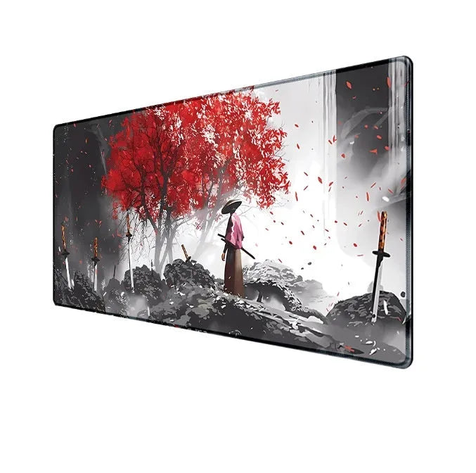 Japanese Samurai design gaming mouse pad on a desk, showing cloth surface and non-slip base.
