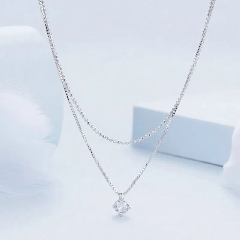 Women's double-layer 925 sterling silver necklace with pearl chain and shining silver finish