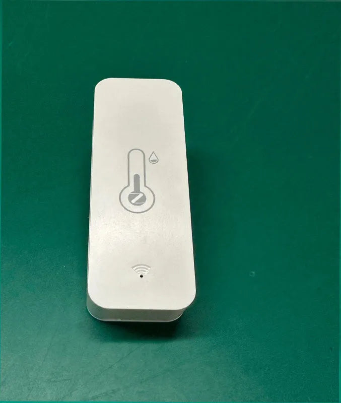 White WiFi temperature and humidity sensor with compact rectangular ABS housing measuring 72mm