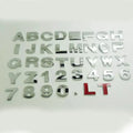 Zinc alloy metal car bumper sticker showing raised 3D letter design in approximately 2.5cm size