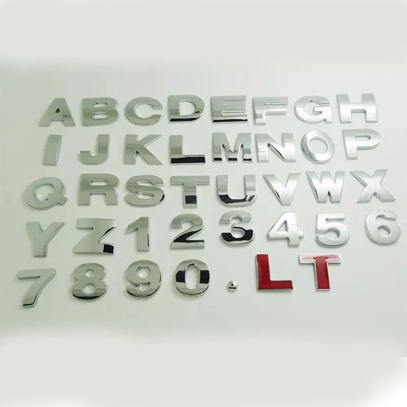Zinc alloy metal car bumper sticker showing raised 3D letter design in approximately 2.5cm size