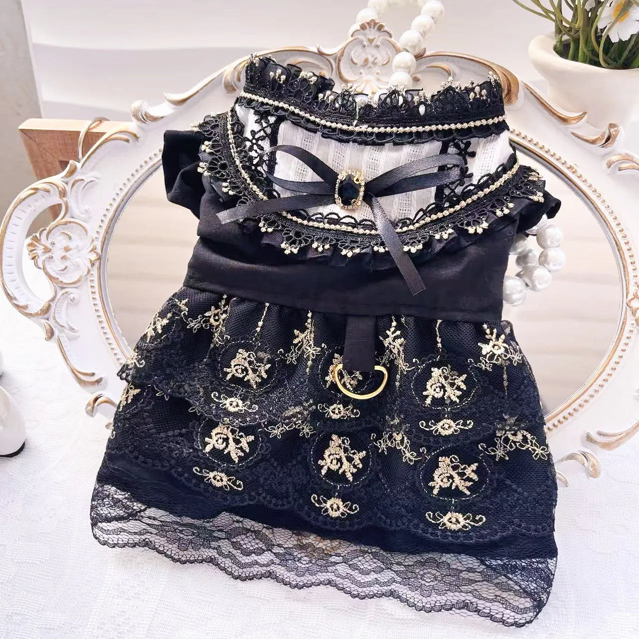 Golden gothic princess-style skirt costume for a small dog on a white background.