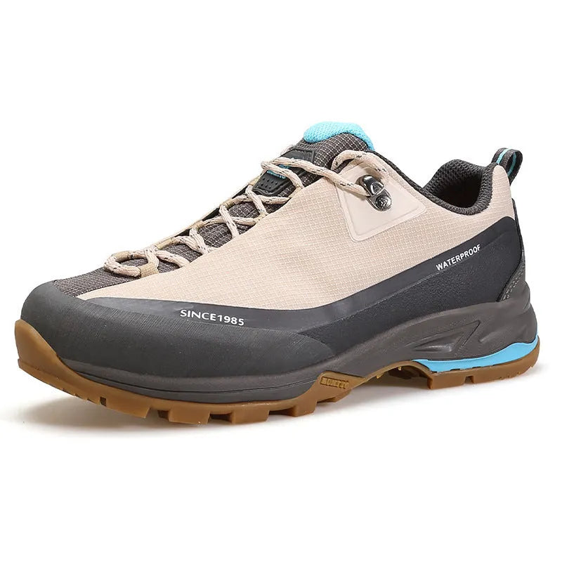 Men's low-top mountain climbing shoes with leather mesh upper and non-slip rubber outsole in black colour