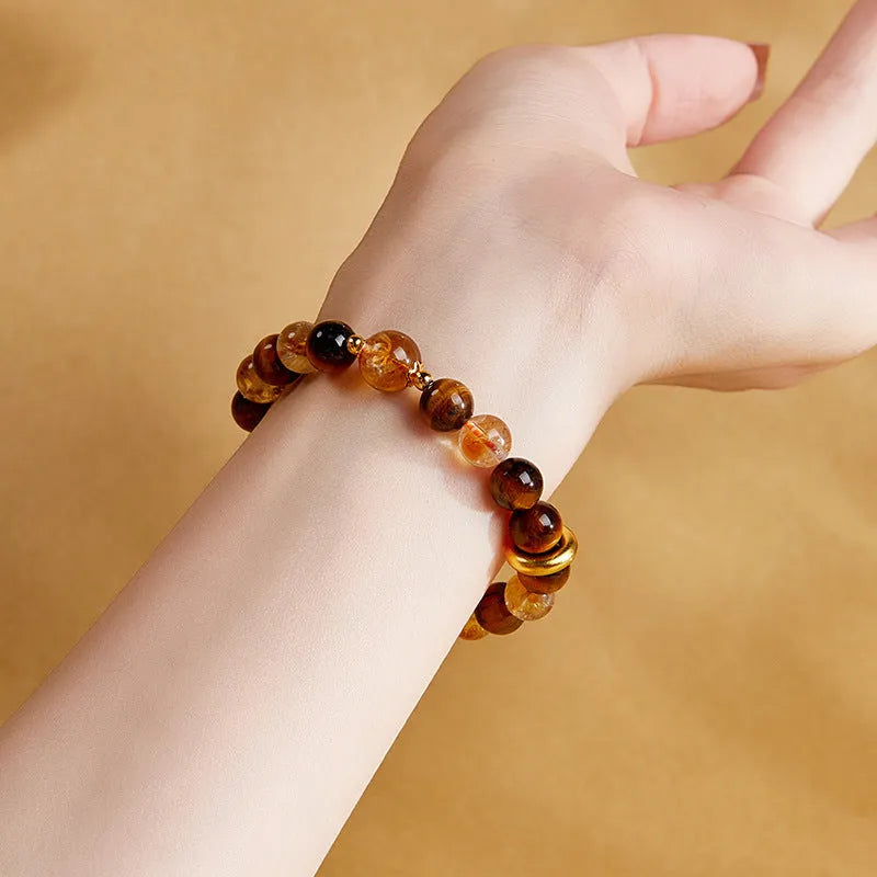 Crystal tigereye beaded bracelet for women, 8mm beads, sterling silver, dome tiger colour, on wrist