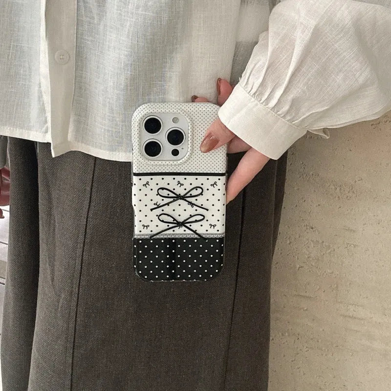 Black and white polka dot stitching stereo bow silicone phone case for iPhone