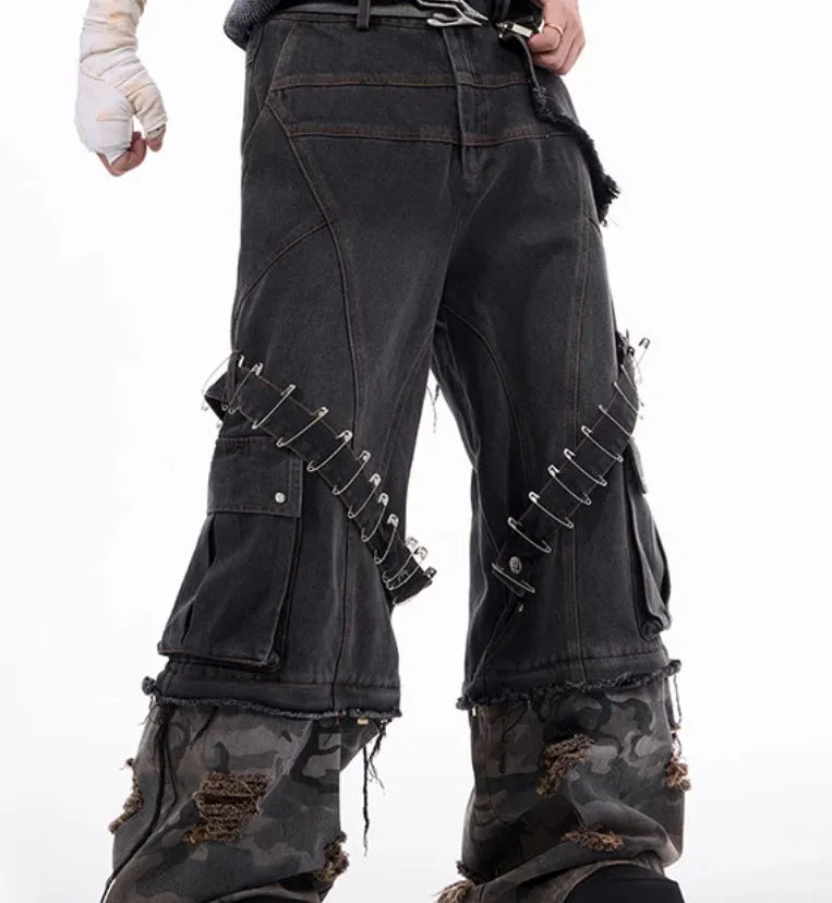 Men's grey jeans with camouflage pattern splicing and decorative pin and ribbon details on cotton denim