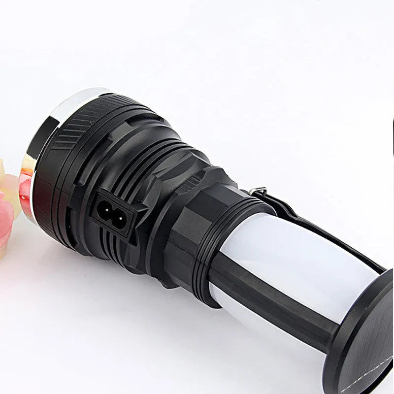 Black solar-powered emergency flashlight with USB charging port