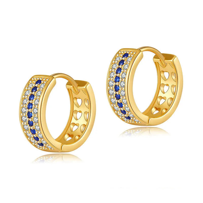 Geometric round women's post earrings with a gold electroplated finish on a copper base.