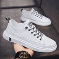 Men's beige casual PU shoes with a low heel and round toe on a flat sole.