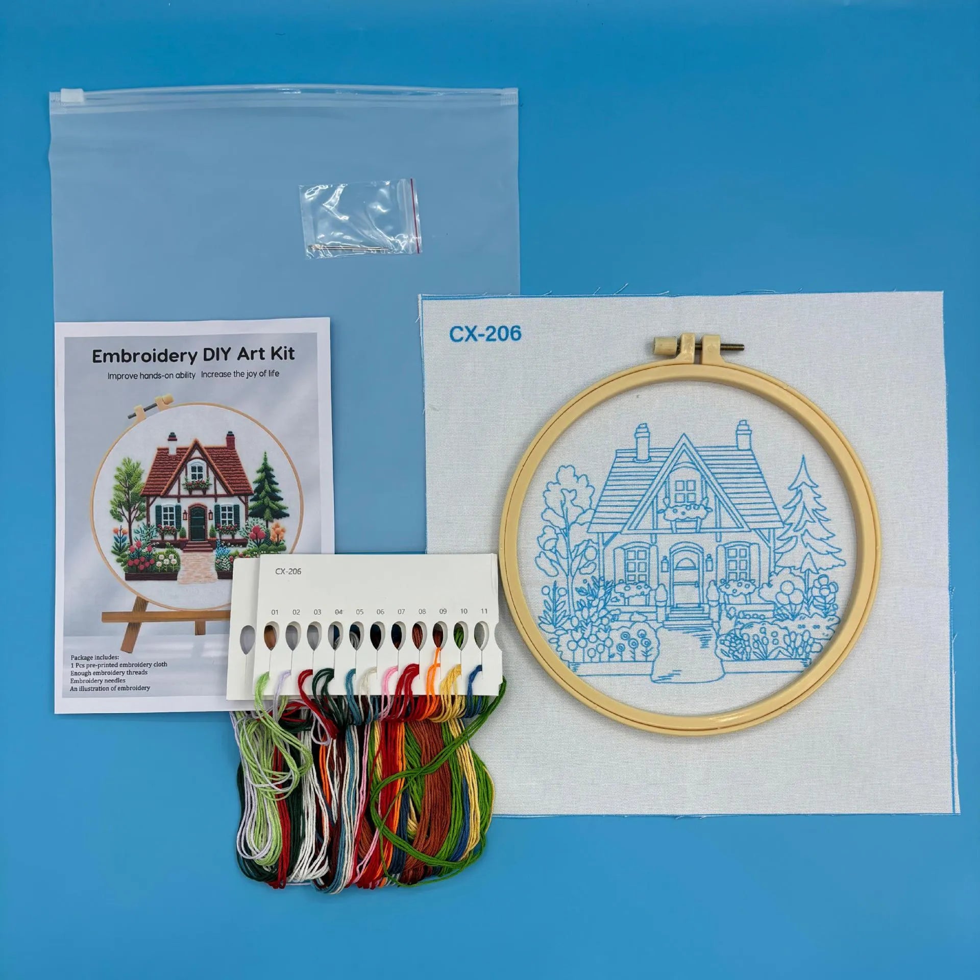 Garden Cottage embroidery material package with 28x28cm pre-printed cotton linen cloth showing landscape scene