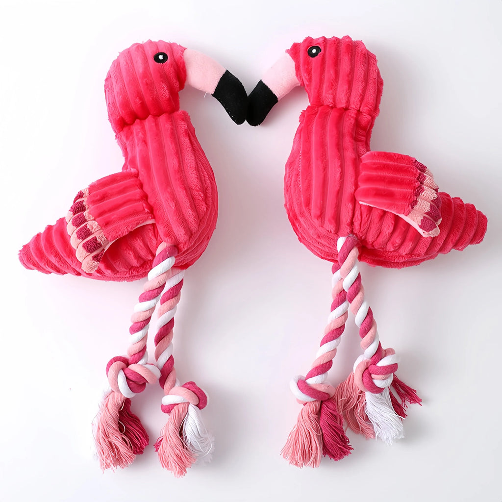 Pink animal-shaped corduroy plush dog toy with a squeaker.