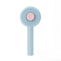 Blue pet grooming brush with self-cleaning button and angled wire needles for cats and dogs