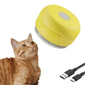Green and yellow rechargeable cat dog steam brush with silicone bristles for pet grooming