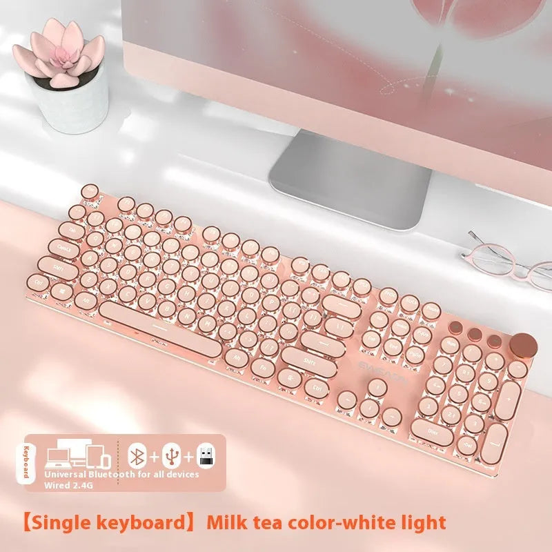 Matcha green mechanical gaming keyboard with multifunction knob on a desk