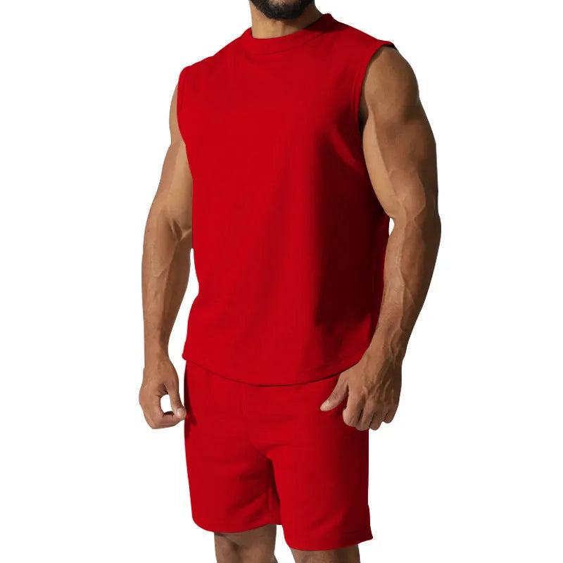 Men's sleeveless cotton blend sports suit showing sleeveless top and matching shorts in a solid colour.