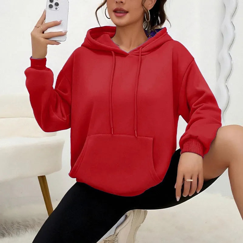 Women's loose drawstring pocket sweatshirt in various colours showing front pockets and adjustable collar