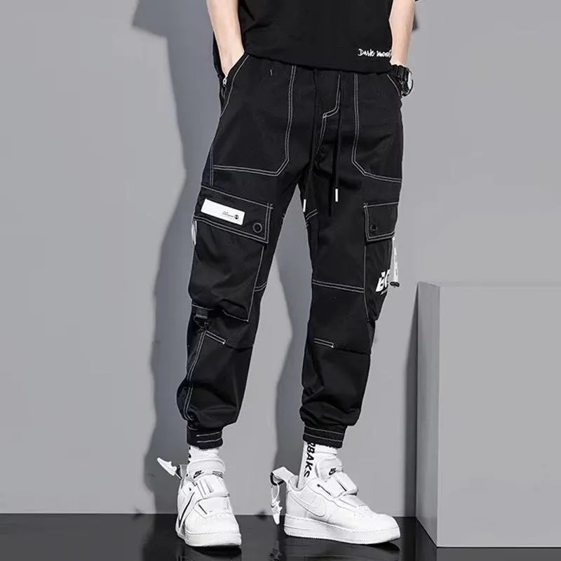 Men's loose fit polyester solid colour trousers in black or gray, autumn casual style, size S to 5XL