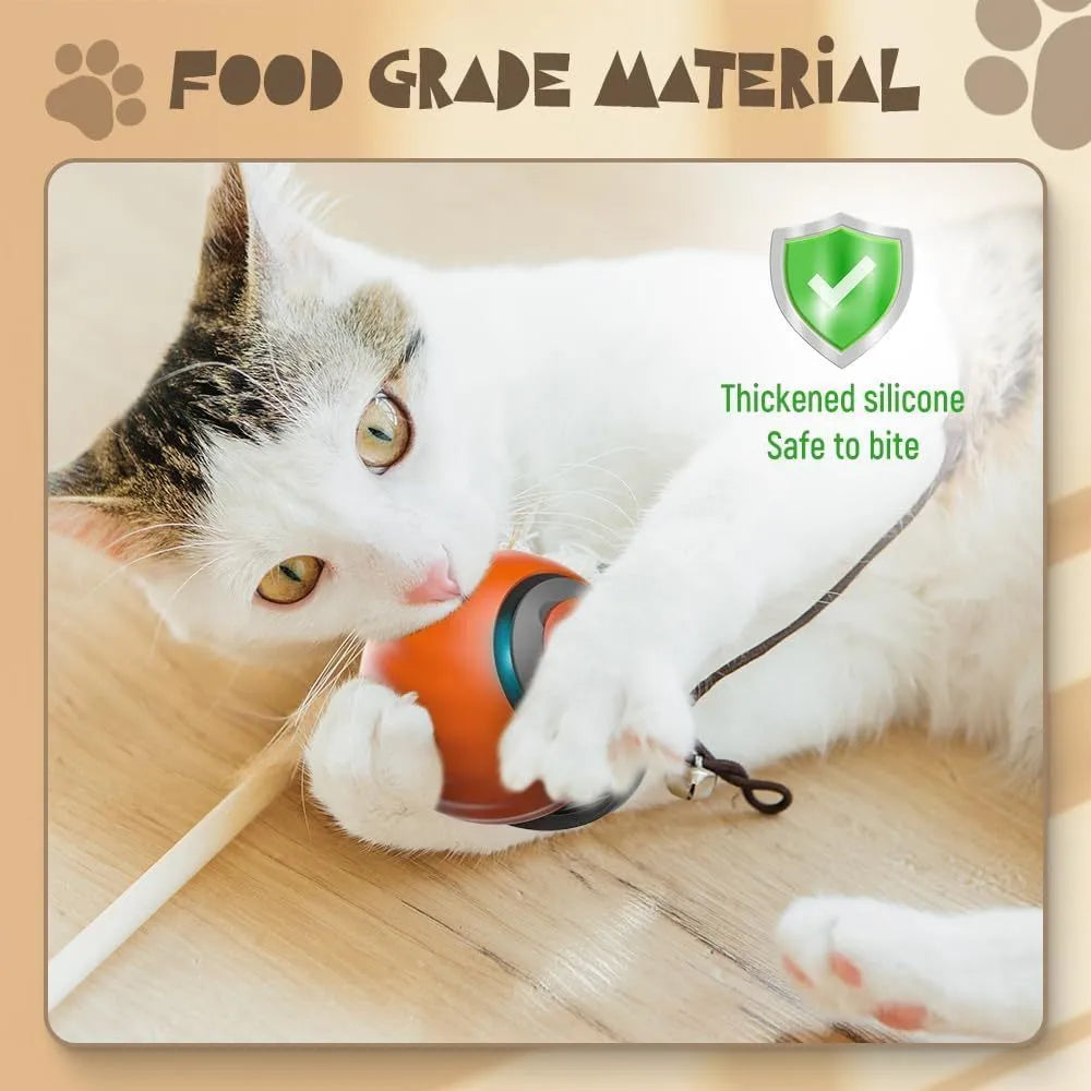 Self-moving cat toy ball in blue on a floor with a cat pawing at it