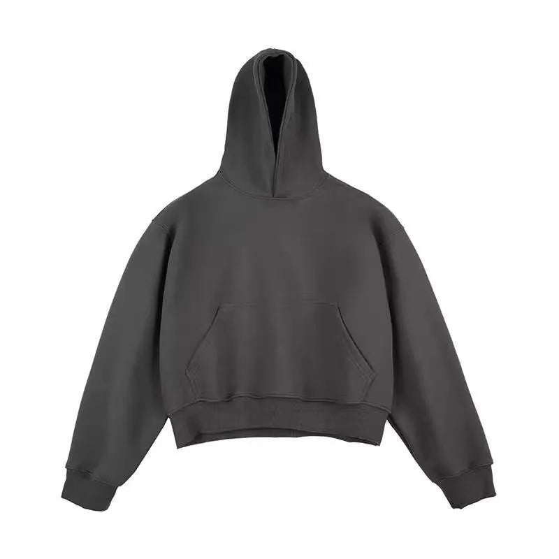 Short black cotton composite velvet hooded sweater with a removable hood on a hanger.