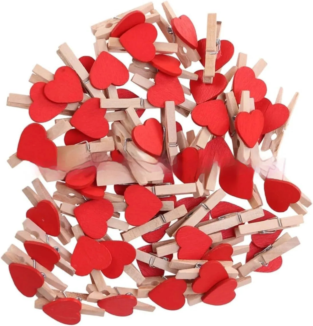 Set of five small wooden heart-shaped hair clips in various colours on a neutral background.