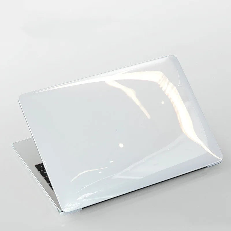 Transparent and black PC hard shell protective case for Apple MacBook Pro laptop.