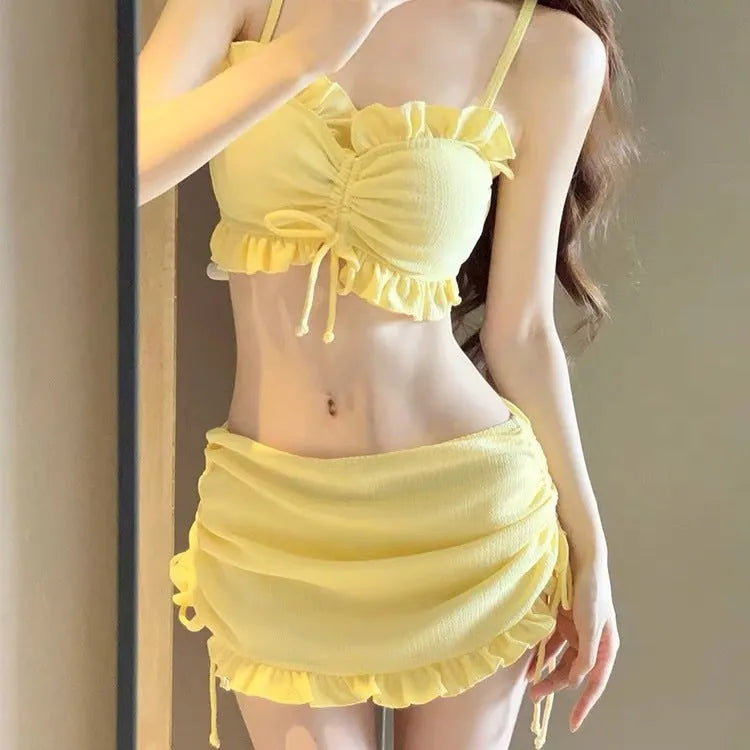 Women's milk silk bikini swimsuit in solid colour, showing separate top and pants.