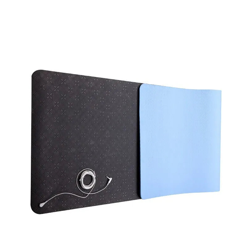 Blue conductive yoga mat with botanical plant pattern, grounding wire, and non-slip surface measuring 182x61cm