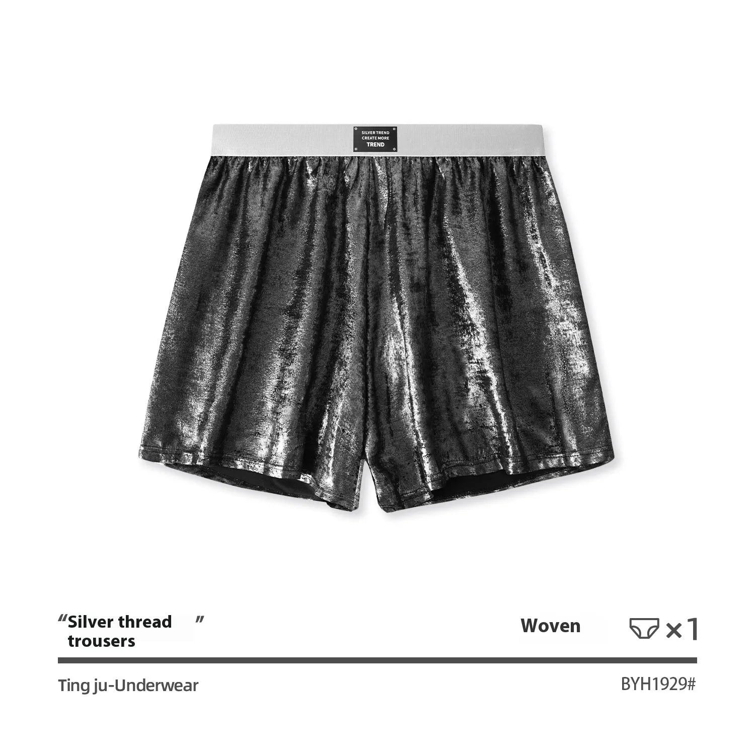 Man wearing galaxy reflective silver loose-fit woven polyester sports shorts.