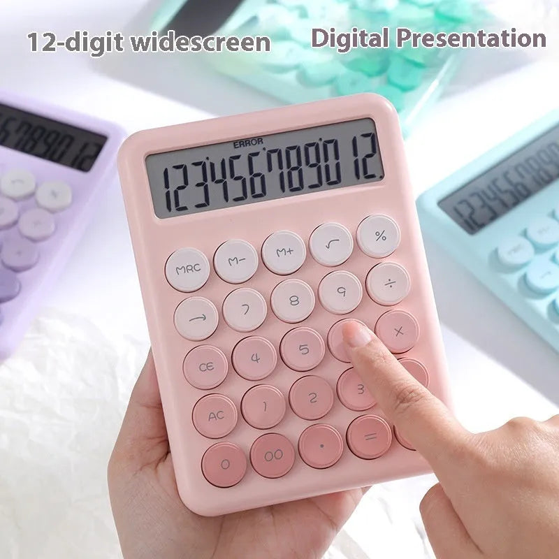 Gradient colour desk calculator showing violet, pink, blue, and green shades on an ABS plastic casing.