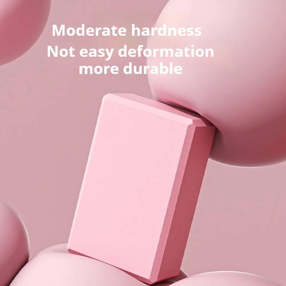 Rectangular EVA foam yoga blocks in blue pink purple rose colours showing dimensions and grip ridges