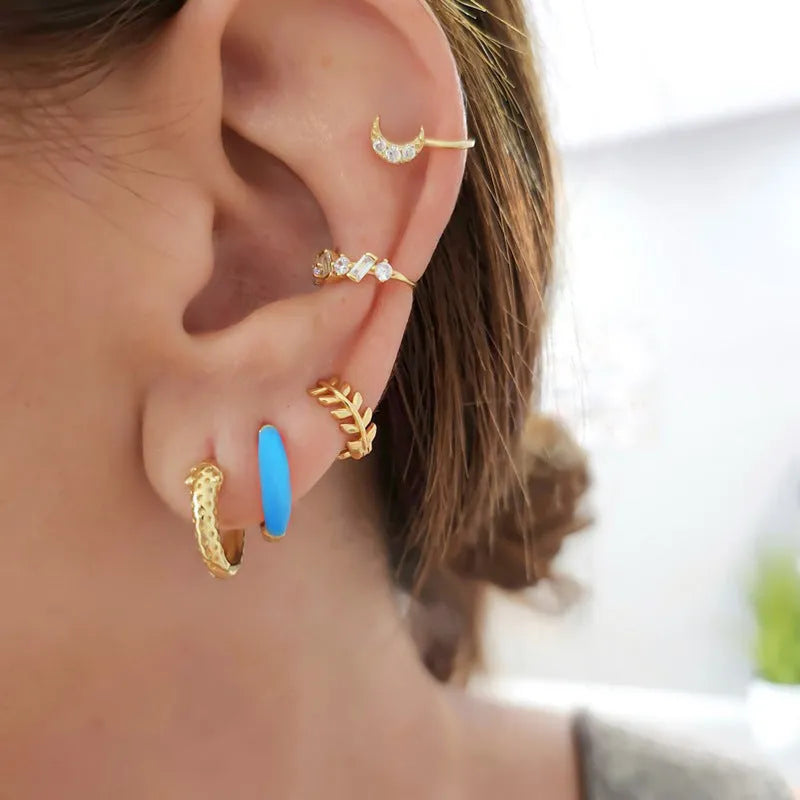Curved oval epoxy earrings with colourful drip finish in geometric U-shape design
